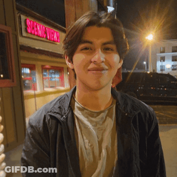 Man In Front Of Scenic View Store GIF