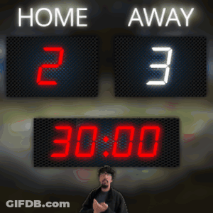 Man In Front Of Scoreboard Reading Home 23 Away GIF