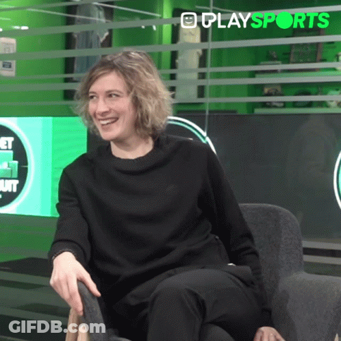 Man In Front Of Screen Saying Play Sports GIF