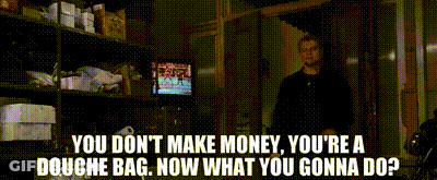 Man In Front Of Shelf Saying You Don't Make Money You're A Douche Bag Now GIF
