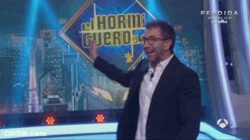 Man In Front Of Sign Saying El Hormi Fuero GIF
