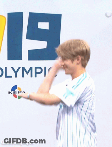 Man In Front Of Sign Saying Olympic GIF
