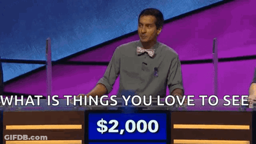 Man In Front Of Sign Saying What Is Things You Love To See Alex $2,000 GIF