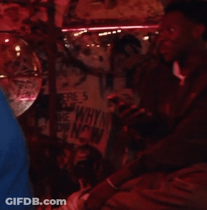 Man In Front Of Sign Saying Why GIF