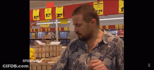 Man In Front Of Spiegel TV Sign GIF