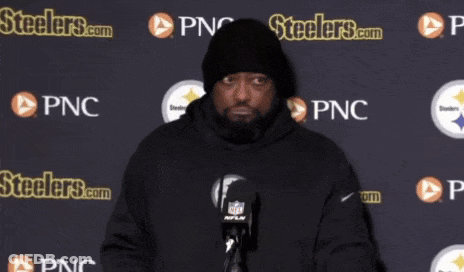 Man In Front Of Steelers.com Wall GIF