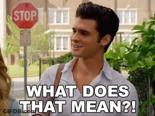 Man In Front Of Stop Sign Saying What Does That Mean GIF
