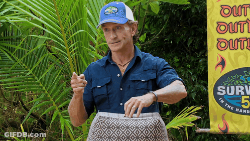Man In Front Of Survivor 5 Banner GIF