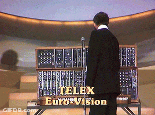 Man In Front Of Telex Euro Vision Machine GIF