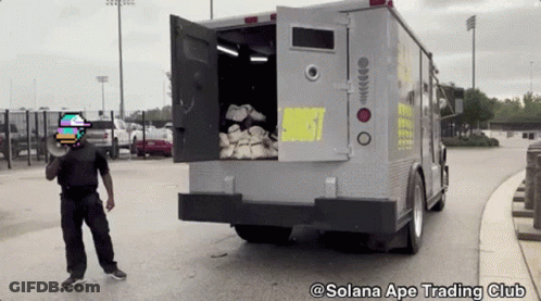 Man In Front Of Truck Saying Solana Ape Trading Club GIF