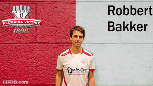 Man In Front Of Wall Saying Robbert Bakker GIF