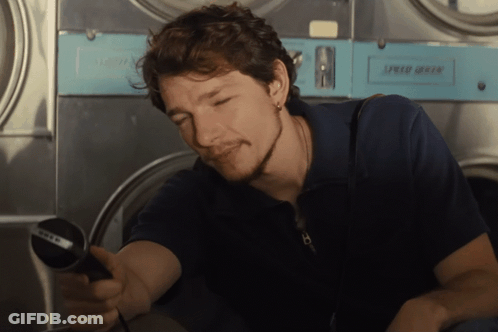 Man In Front Of Washing Machine Saying Speed Dry GIF