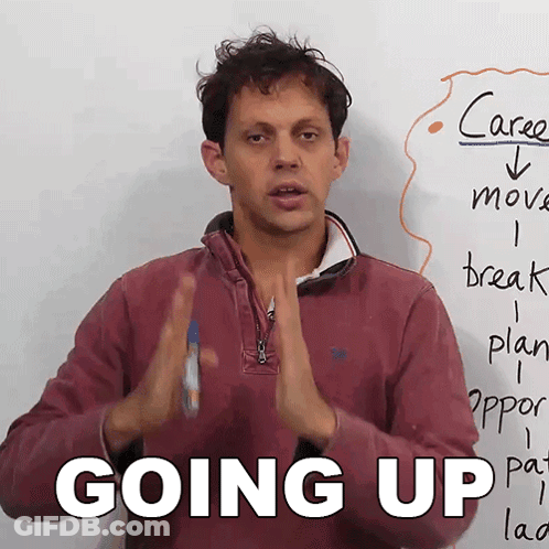 Man In Front Of White Board Saying Going Up GIF