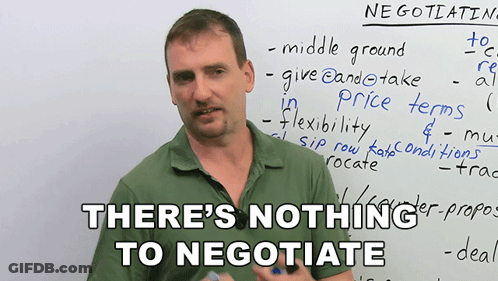 Man In Front Of White Board Saying Nothing To Negotiate GIF