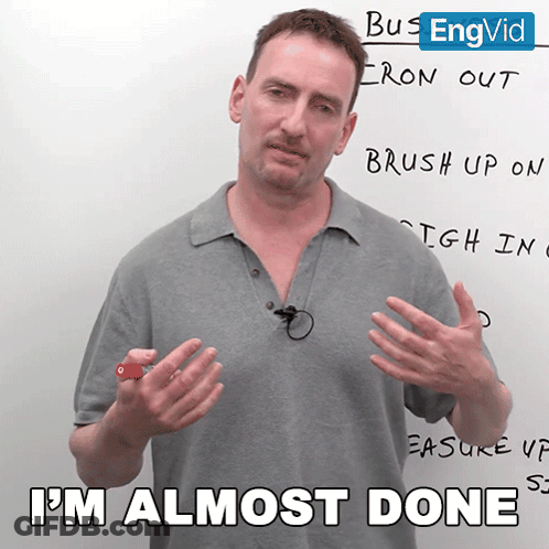 Man In Front Of Whiteboard Saying I'm Almost Done GIF