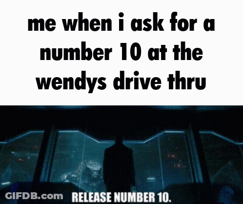 Man In Front Of Window Saying Release Number 10 GIF