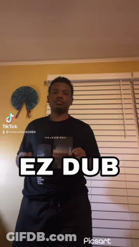 Man In Front Of Window With EZ Dub On Shirt GIF