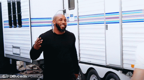 Man In Front Of World Of Dance Trailer GIF