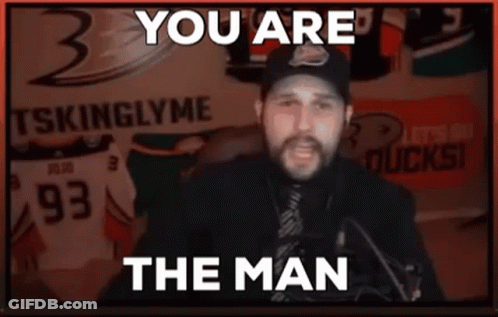 Man In Front Of You Are The Man Sign GIF