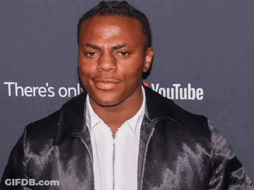 Man In Front Of YouTube Logo GIF