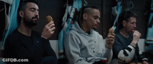Man In Frosty Hoodie Eating Ice Cream GIF