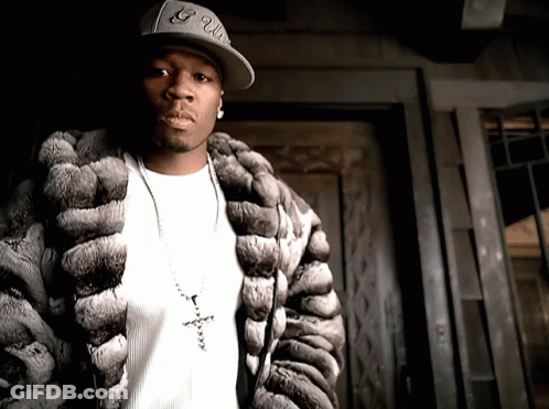 Man In Fur Coat And 50 Cent Hat GIF