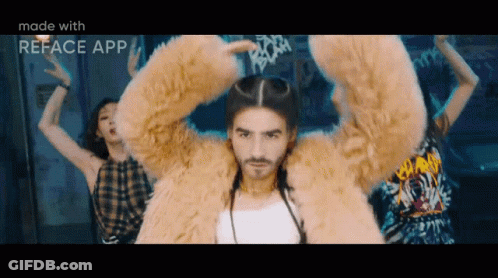 Man In Fur Coat Dancing In Front Of Reface App Wall GIF