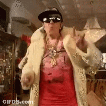 Man In Fur Coat Hat Sunglasses Necklace Dancing GIF