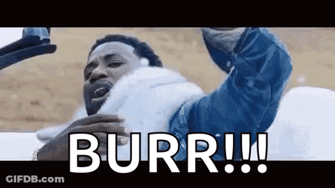 Man In Fur Coat Holding Gun Saying Burr GIF