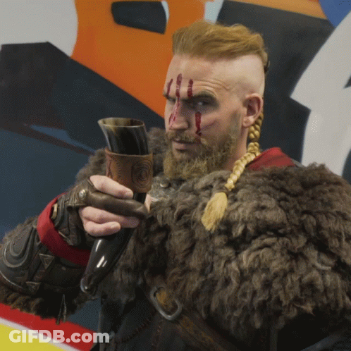Man In Fur Coat Holding Horn GIF