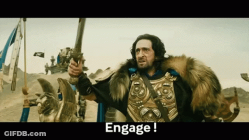 Man In Fur Coat Holding Sword Saying Engage GIF