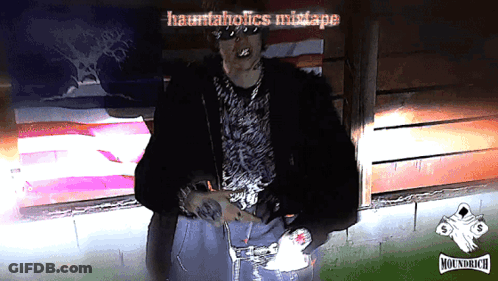 Man In Fur Coat In Front Of Hauntedholics Mistake Sign GIF