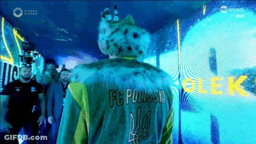 Man In Fur Coat With FC Polssia GIF