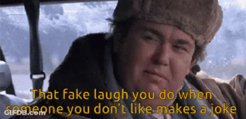 Man In Fur Hat Fake Laugh GIF