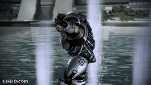 Man In Futuristic Suit Standing Before Water GIF