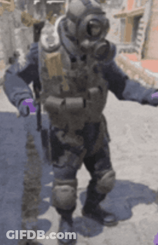 Man In Gas Mask And Purple Gloves On Street GIF