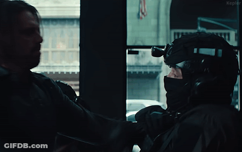 Man In Gas Mask Fighting Another Man GIF
