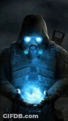 Man In Gas Mask Holding Glowing Object GIF