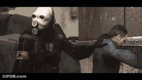 Man In Gas Mask Next To Another Man In Video Game GIF