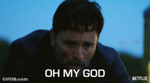 Man In Giant T-Shirt Holding Hammer GIF