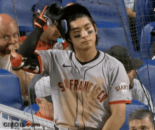 Man In Giants Jersey In Stands GIF
