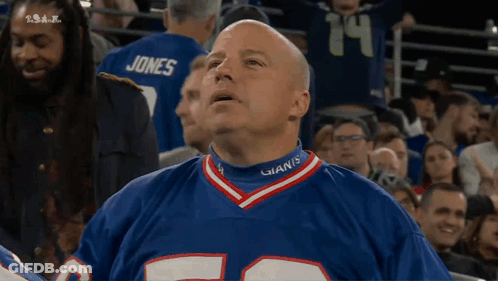 Man In Giants Jersey Watching Game GIF