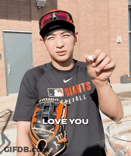 Man In Giants Shirt Holding Baseball Glove GIF