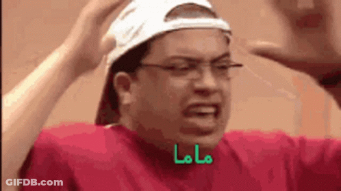 Man In Glasses And Baseball Cap Making Funny Face GIF