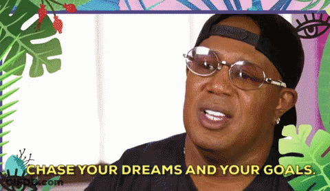 Man In Glasses And Baseball Cap Says Chase Your Dreams And Your Goals GIF