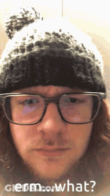 Man In Glasses And Beanie Saying Erm What GIF