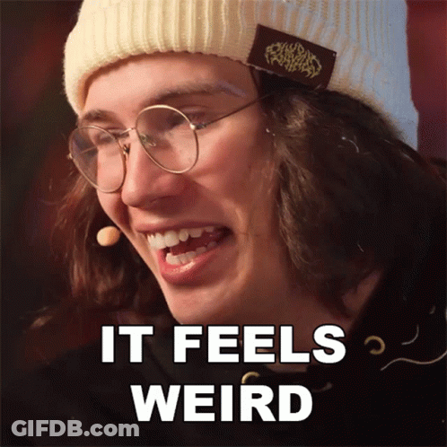 Man In Glasses And Beanie Saying It Feels Weird GIF