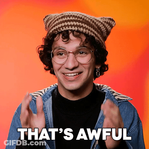 Man In Glasses And Beanie Says That's Awful GIF