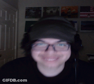 Man In Glasses And Beanie Sticking Out Tongue GIF