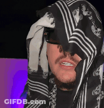 Man In Glasses And Black And White Head Scarf GIF